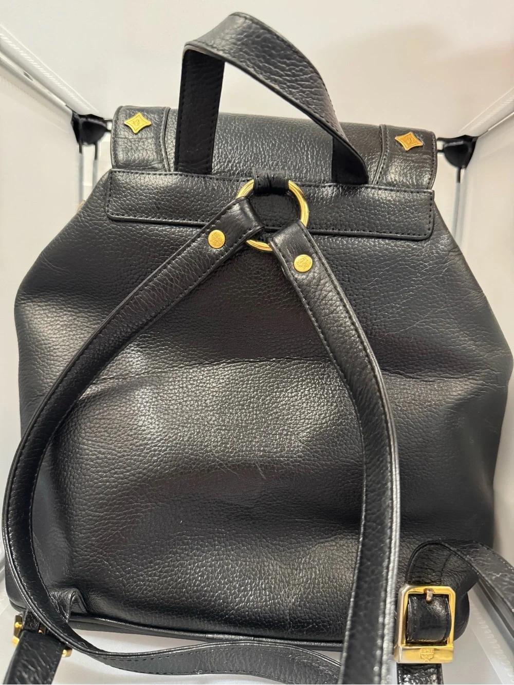 MCM Black Leather Backpack with Gold Logo Accents